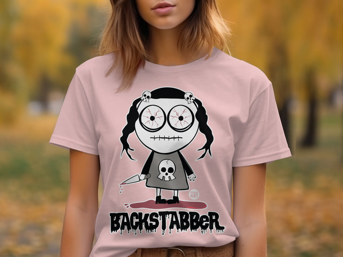 Backstabber Graphic T-Shirt with Unique Artwork